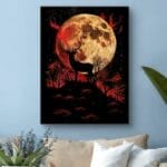 Plakat do salonu jeleń na tle pełnego księżyca