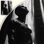 Plakat Mężczyzna w promieniach światła